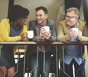 Co-workers enjoy coffee break