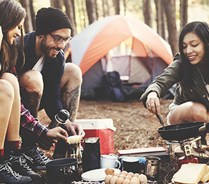 Friends camping to save on a weekend getaway