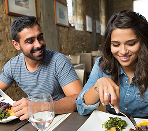 A couple eats on a budget while traveling